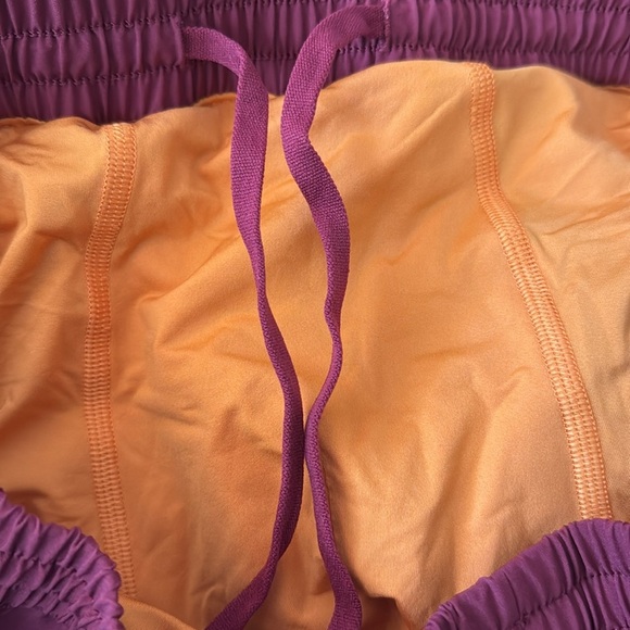 E Peloton burgundy/orange elastic drawstring waist technical fabric shorts. Med - Picture 4 of 5